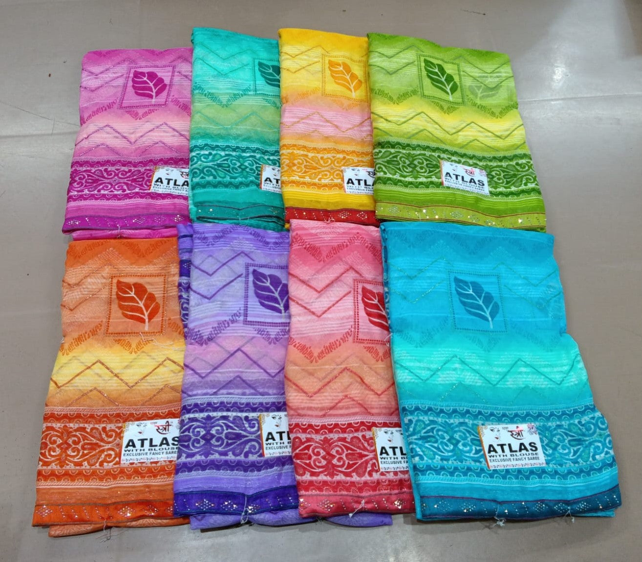 Atlas Ekstree Weightless Fancy Print Saree Set – 8 Pcs -M.R. Saree Emporium