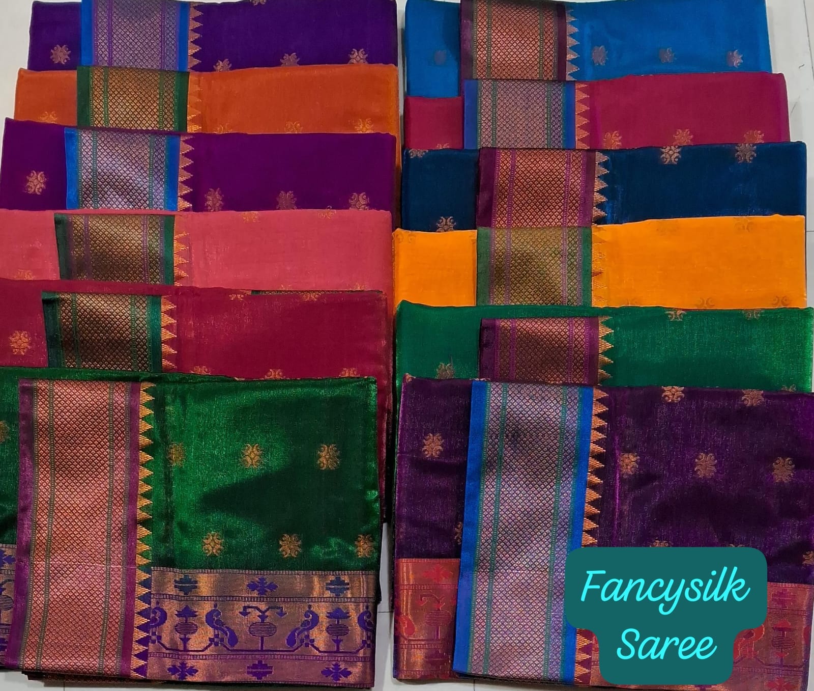 Fancy Silk Saree – Rich Border & Traditional Design M.R. Saree Emporium