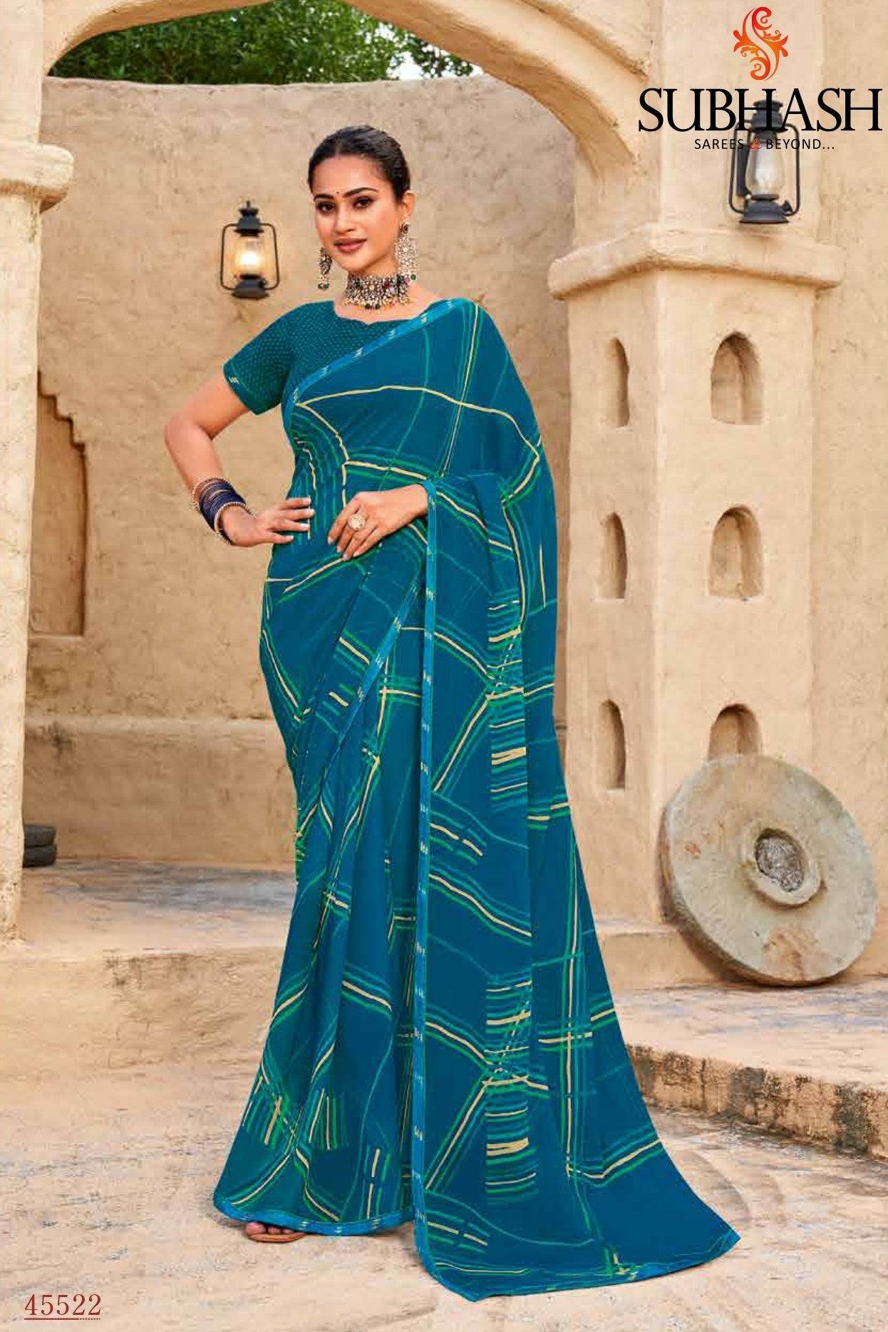 Subhash Sarees Radha-09 D.No-45522 Teal Blue Printed Georgette Saree With Border - M.R. Saree Emporium